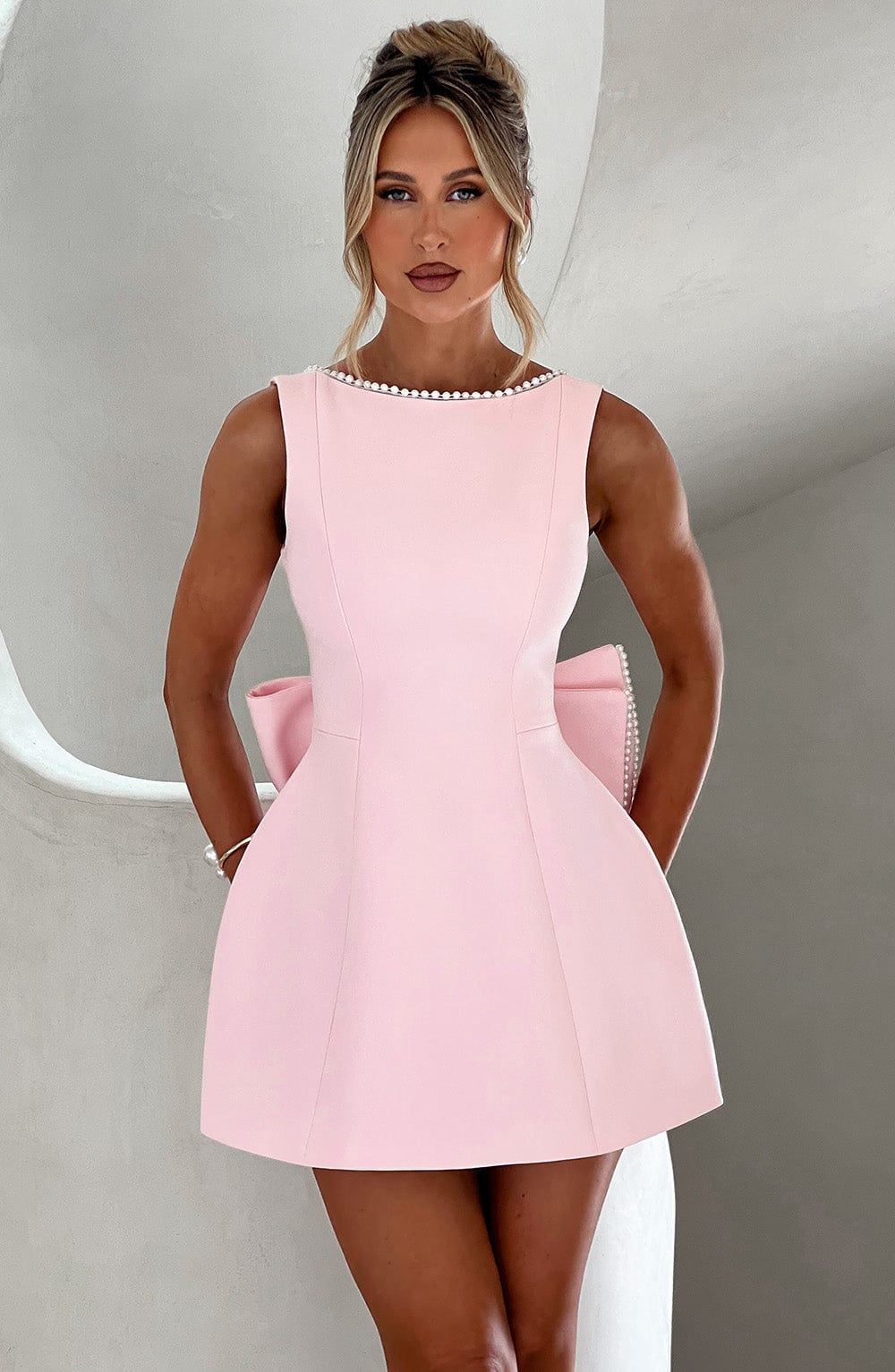 Elegant Pearl Trim Mini Dress for Women with Boat Neck Sleeveless Open Back Bow Detail Cocktail Style
