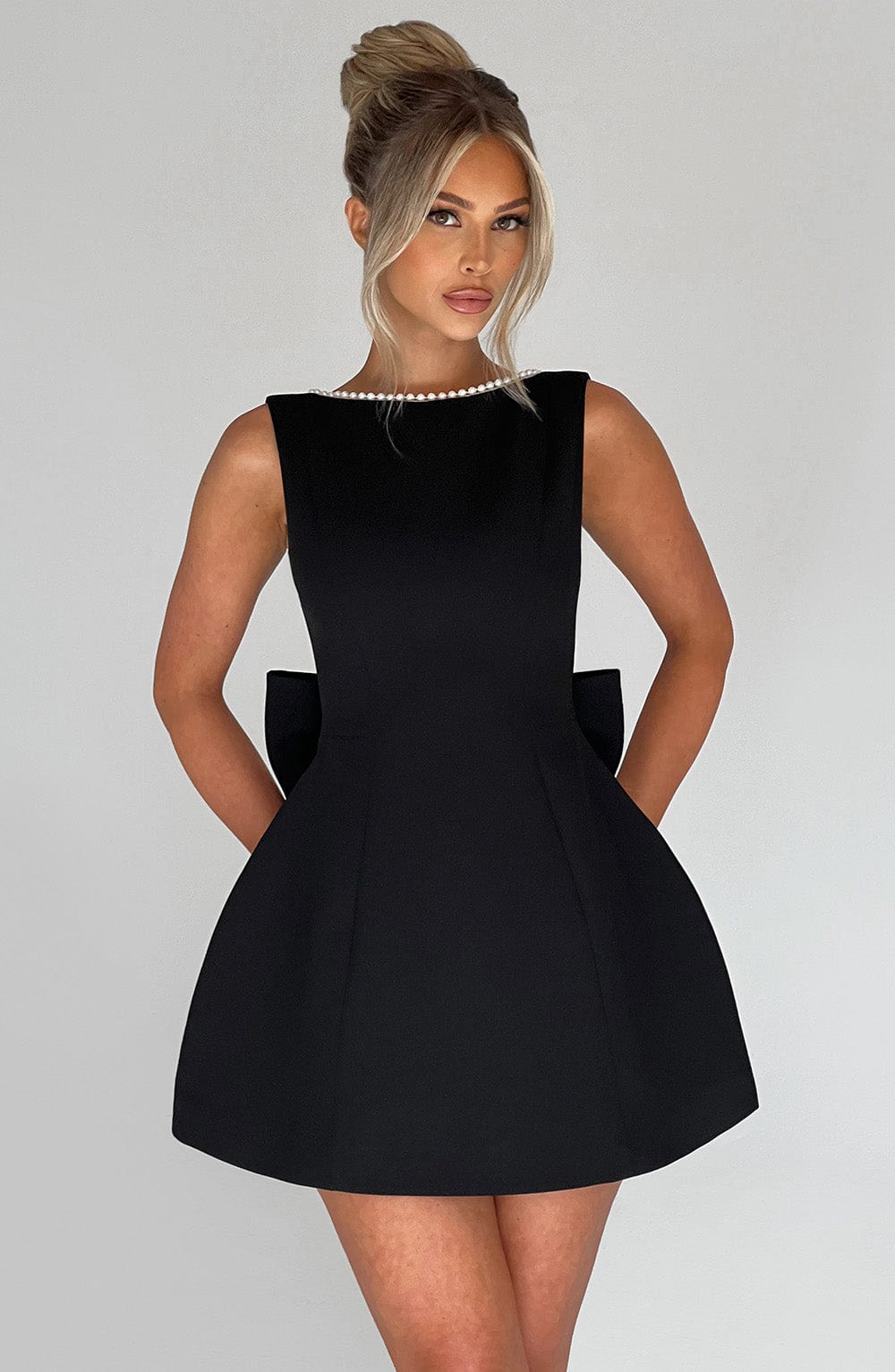 Elegant Pearl Trim Mini Dress for Women with Boat Neck Sleeveless Open Back Bow Detail Cocktail Style