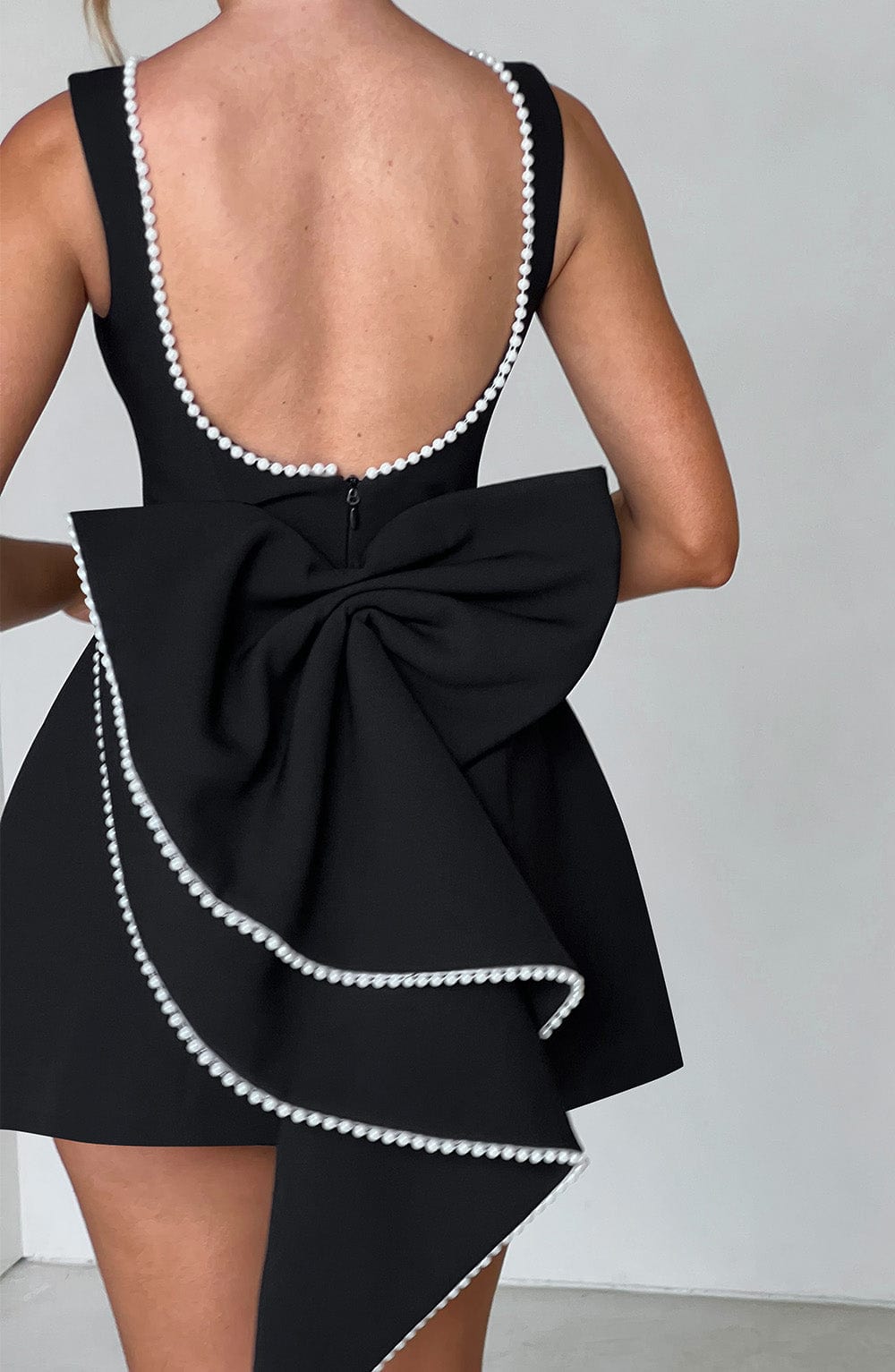 Elegant Pearl Trim Mini Dress for Women with Boat Neck Sleeveless Open Back Bow Detail Cocktail Style